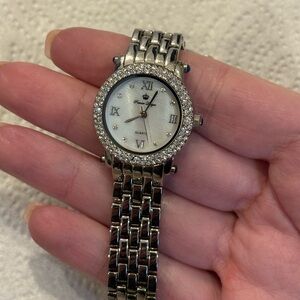 Women’s Premier Designs watch silver band, mother of pearl dial, crystal accents